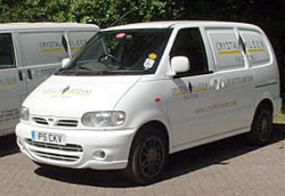 image of Crystal Kleen white van parked in the sun